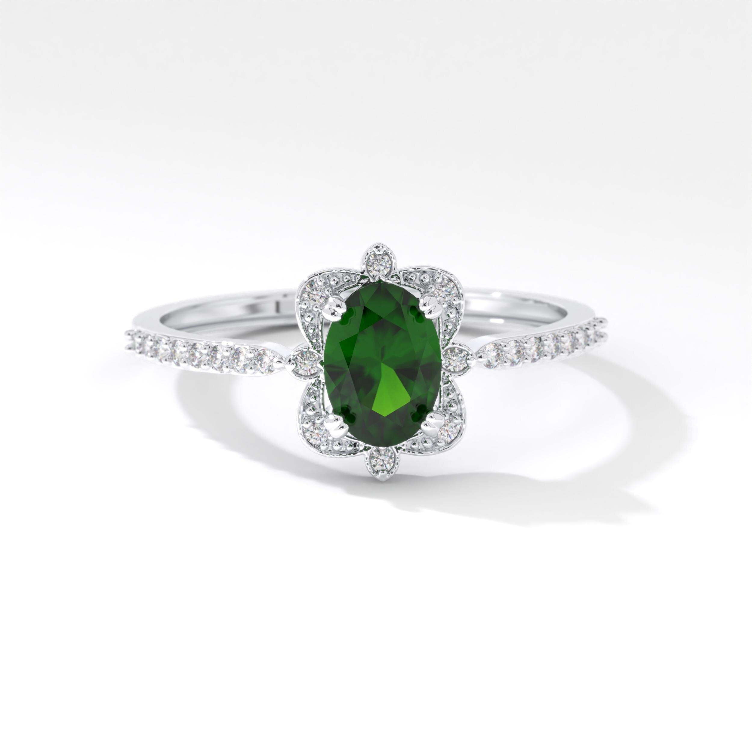 Oval Emerald Engagement Ring – 10K / 14K / 18K Solid Gold 💚✨
A stunning oval-cut emerald set on a slim art deco-inspired band, accented with sparkling round diamonds. Perfect as a birthstone, engagement, or wedding ring, this elegant design can also be customized with Diamond or Moissanite side stones upon request.