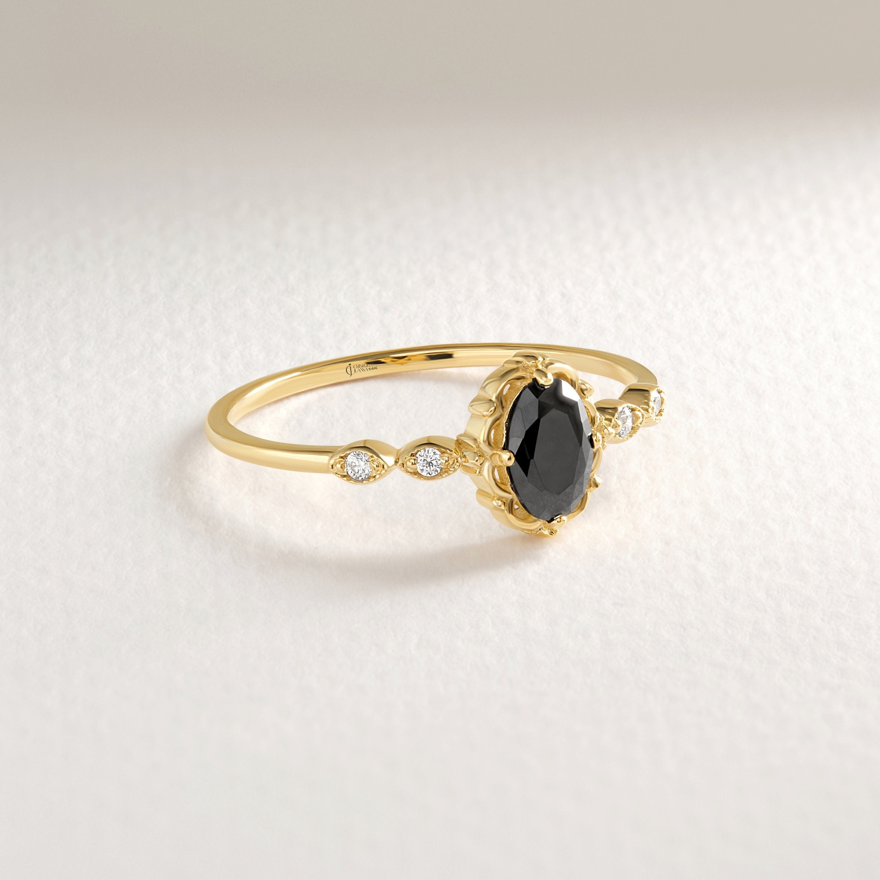 ChatGPT:

🖤 Onyx Diamond Engagement Ring – 14K Solid Gold Art Deco Vintage Design 💍

Elegant, bold, and timeless — this Onyx Diamond Engagement Ring brings together the mystique of deep black onyx with the sparkle of dazzling side stones. Designed with a refined Art Deco touch, it’s a perfect piece for brides who love classic beauty with a modern edge.