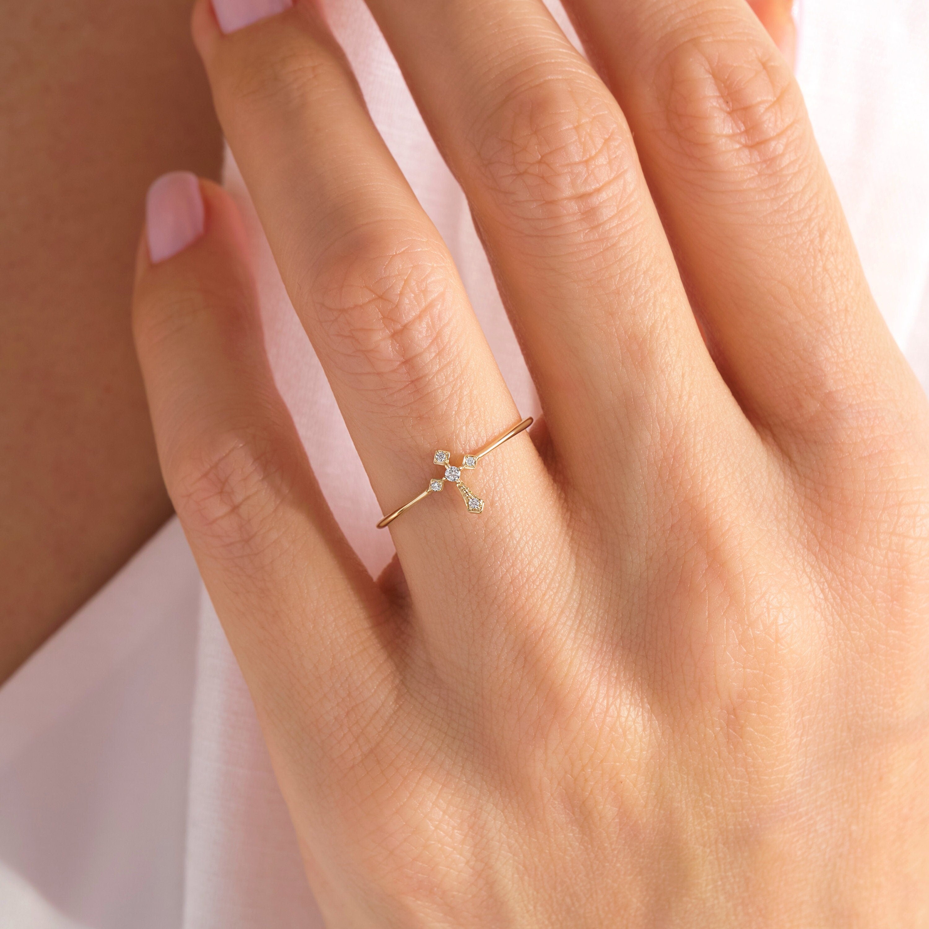 14K Solid Gold Cross Diamond Ring – Stackable Religious Rosary Band ✝️💎
Graceful and symbolic, this cross diamond ring blends faith and elegance in a sleek, minimalist design. Perfect for daily wear or stacking, it’s a meaningful piece that honors spirituality and timeless style. Whether you wear it as a Christian ring for women, a baptism gift, or a simple religious 10K ring, this piece will always carry deep significance.