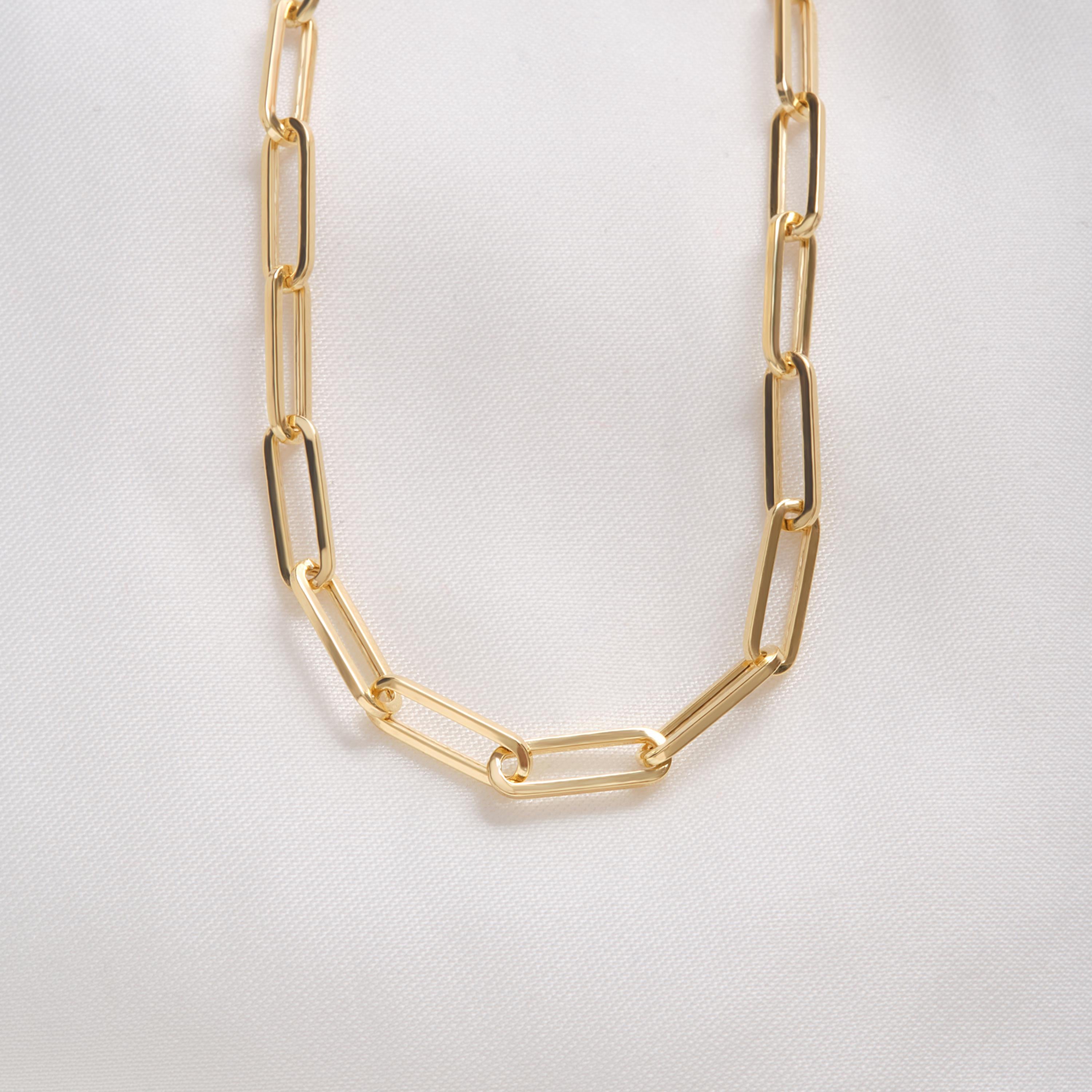 Paperclip Chain Necklace – 14K Solid Yellow Gold Rectangle Link Chain 💛✨
A timeless essential for modern elegance — this paperclip chain necklace is crafted in solid 14K yellow gold with bold, rectangular links that catch the light beautifully. Measuring 4 mm in width, it’s the perfect piece for layering or wearing solo, blending minimalist charm with luxurious craftsmanship.