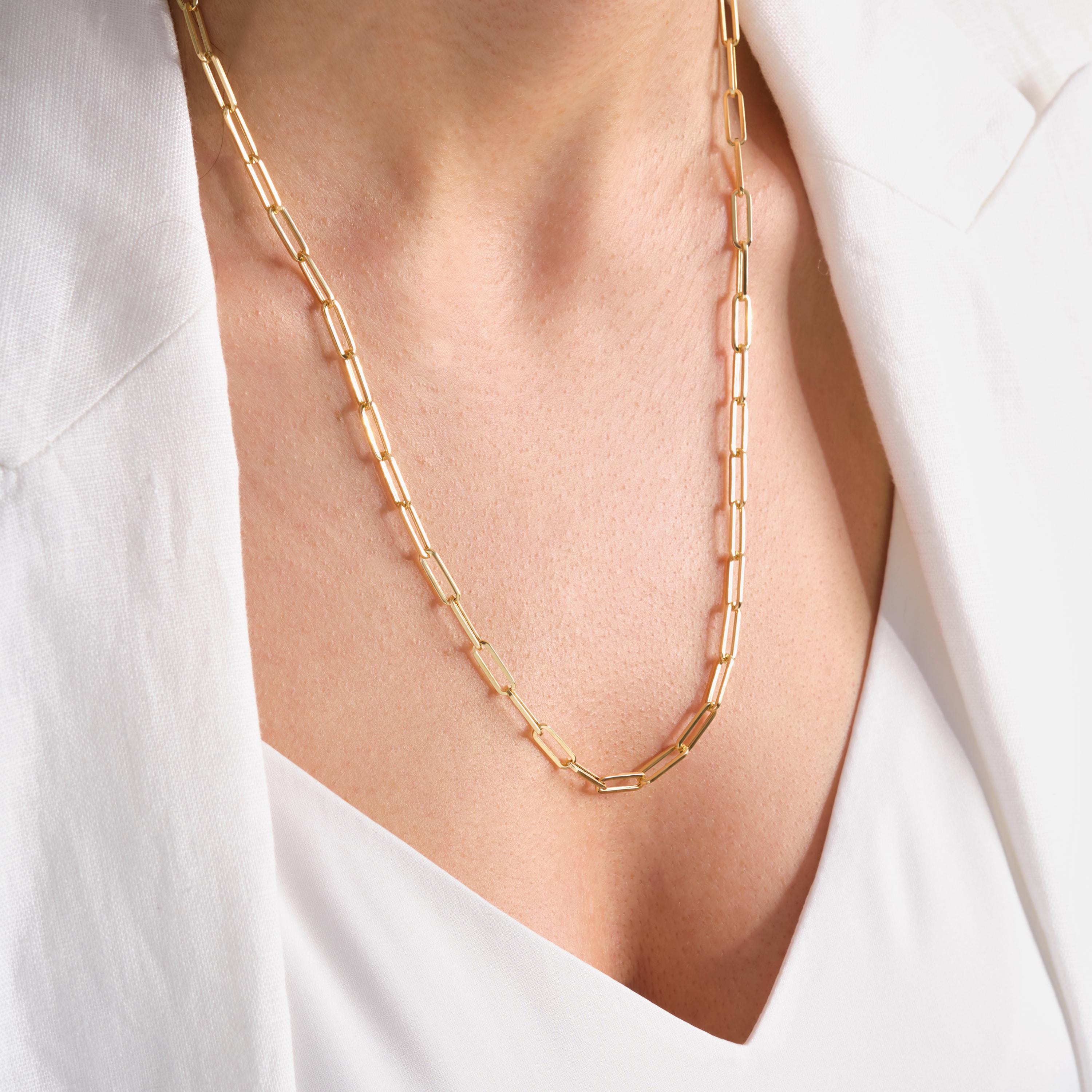 Paperclip Chain Necklace – 14K Solid Yellow Gold Rectangle Link Chain 💛✨
A timeless essential for modern elegance — this paperclip chain necklace is crafted in solid 14K yellow gold with bold, rectangular links that catch the light beautifully. Measuring 4 mm in width, it’s the perfect piece for layering or wearing solo, blending minimalist charm with luxurious craftsmanship.