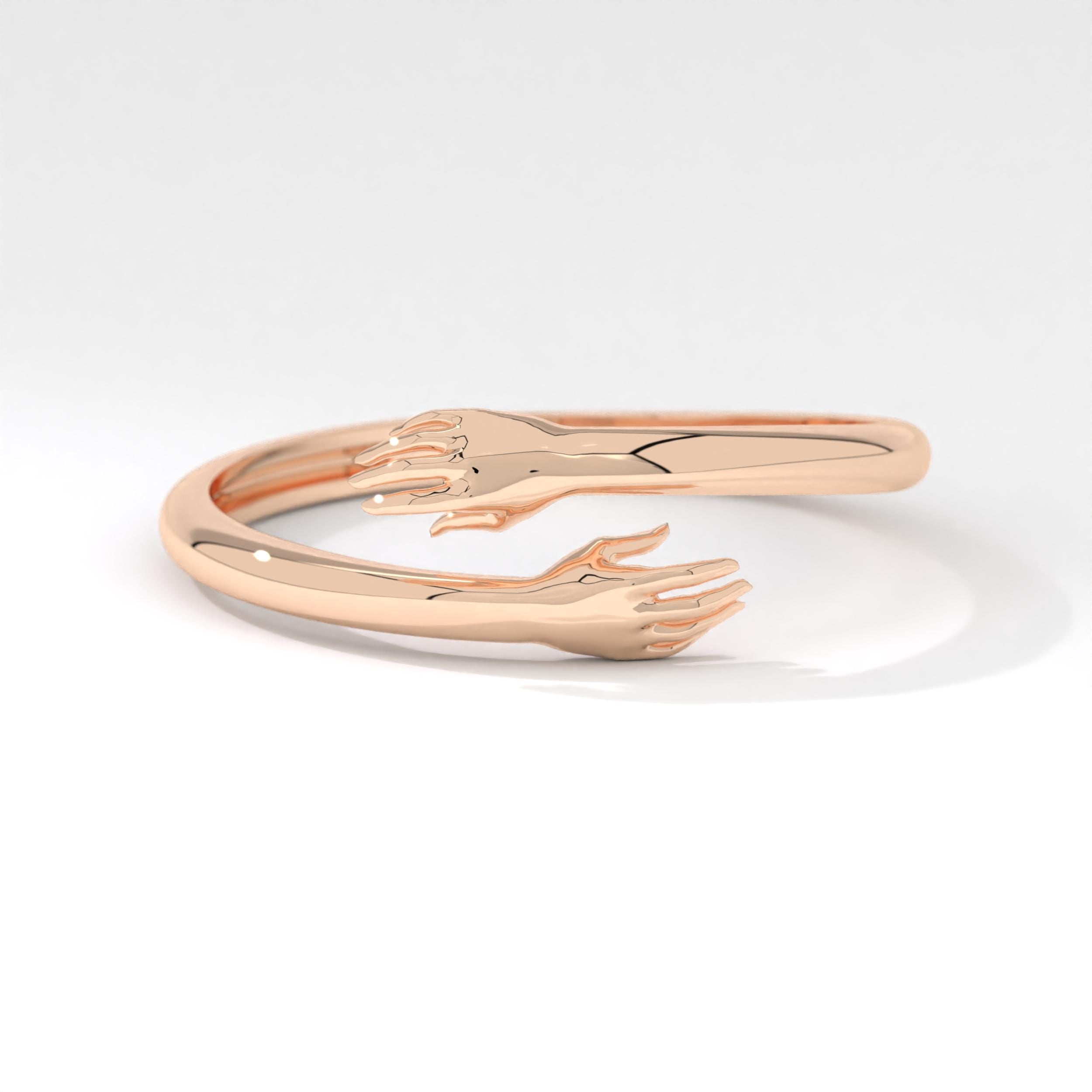 A gold ring that symbolizes a constant embrace for the one you gift it to. Available in various gold purities, it's an elegant and meaningful choice for any occasion.