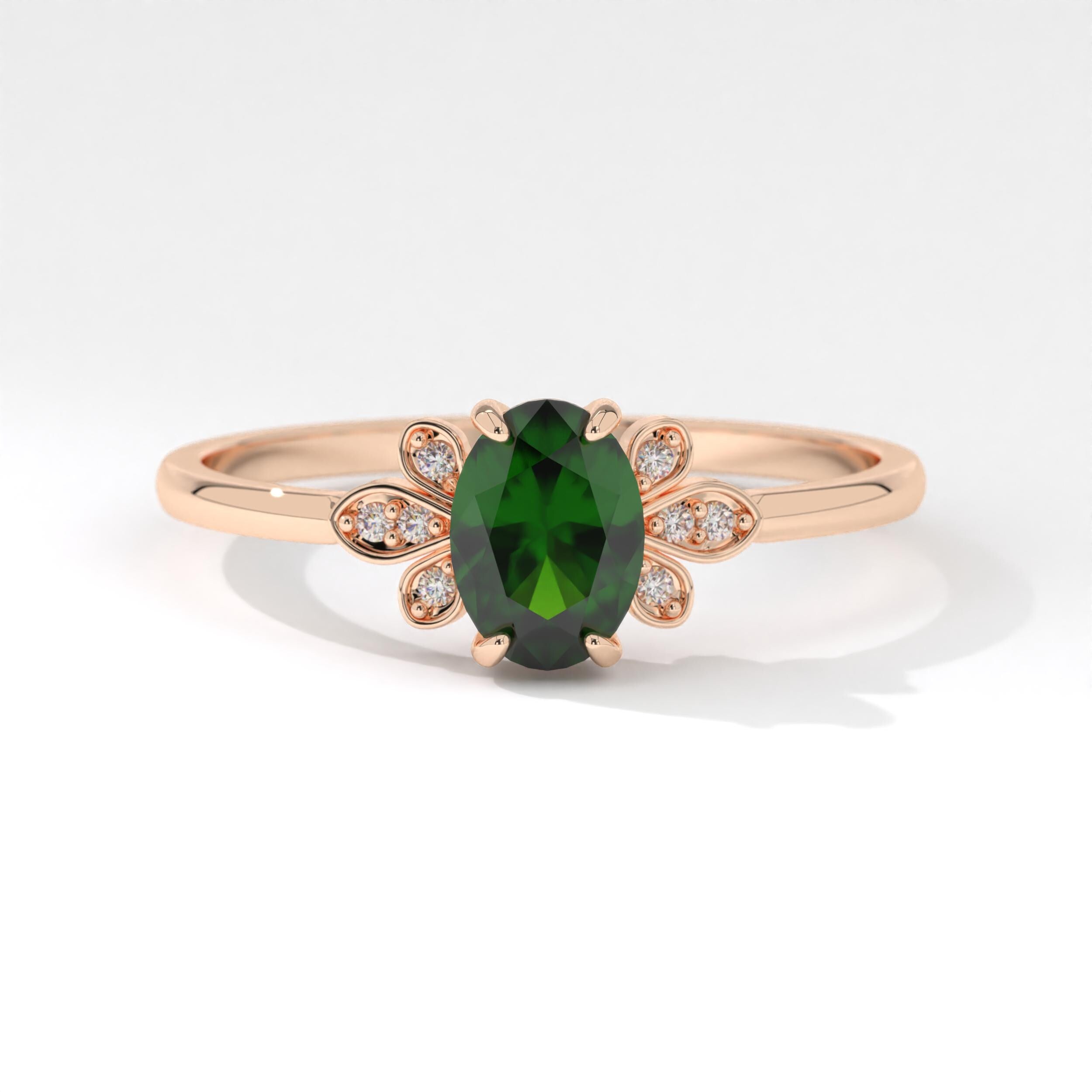 14K rose gold oval ring featuring a stunning design that beautifully complements ruby or simulated diamond stones. Perfect for creating a warm and elegant look with personalized birthstone options.