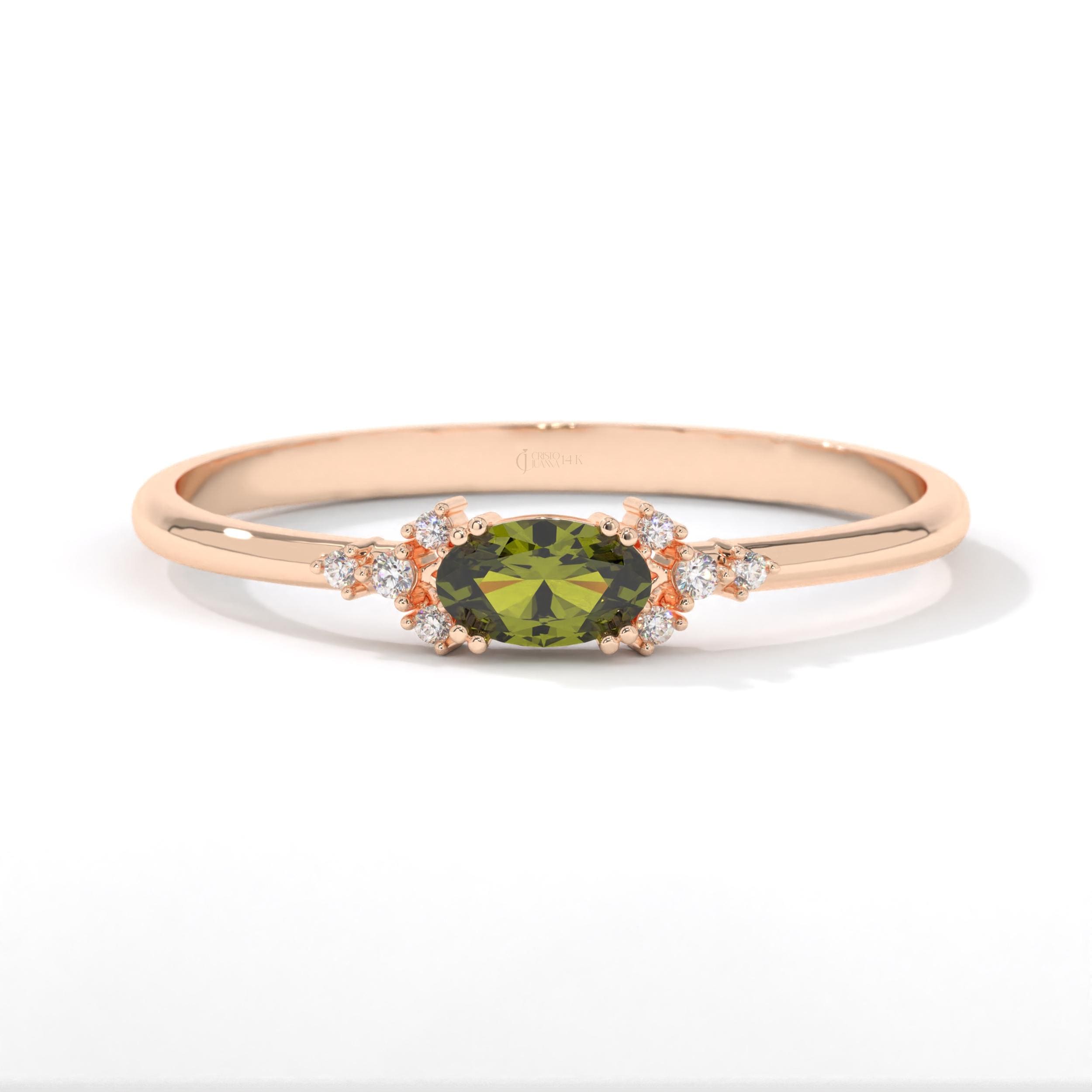 14K Gold Peridot Diamond Ring – Dainty Oval Birthstone Stacking Band 💚✨
Celebrate elegance and meaning with this handcrafted gold peridot ring, featuring a vibrant natural oval peridot and sparkling diamond or moissanite accents. Designed to be worn solo or as part of a dainty stacking ring set, this gemstone band radiates warmth, light, and timeless charm.