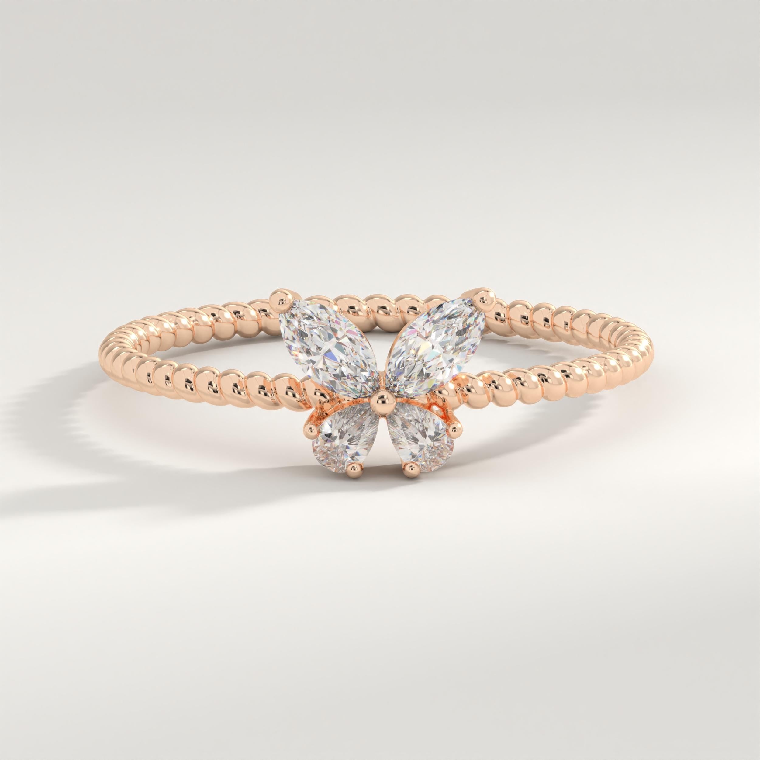 Marquise Diamond Butterfly Ring – 14K Solid Gold ✨💎
This stunning butterfly-inspired diamond ring features marquise and pear-cut stones forming delicate wings atop a braided gold band. A perfect mix of nature’s grace and timeless beauty — ideal for brides, bridesmaids, or anyone who loves elegant sparkle. 🦋💍
