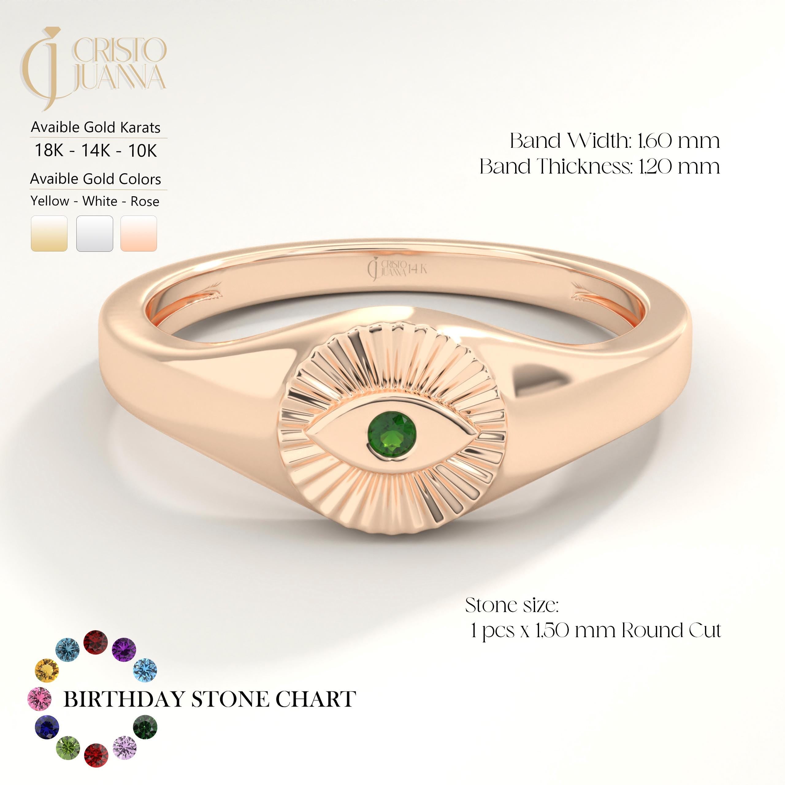 ChatGPT:

💚 Emerald Eye Signet Ring – 14K Solid Gold Bezel Set Evil Eye Dome Band 💍

Protective, elegant, and full of symbolism — this Emerald Eye Signet Ring brings a modern twist to the ancient evil eye design. Crafted from solid gold and featuring a brilliant green cubic zirconia stone, this dainty yet bold piece radiates both style and meaning. Perfect as a pinky ring, everyday statement, or symbolic gift of protection.