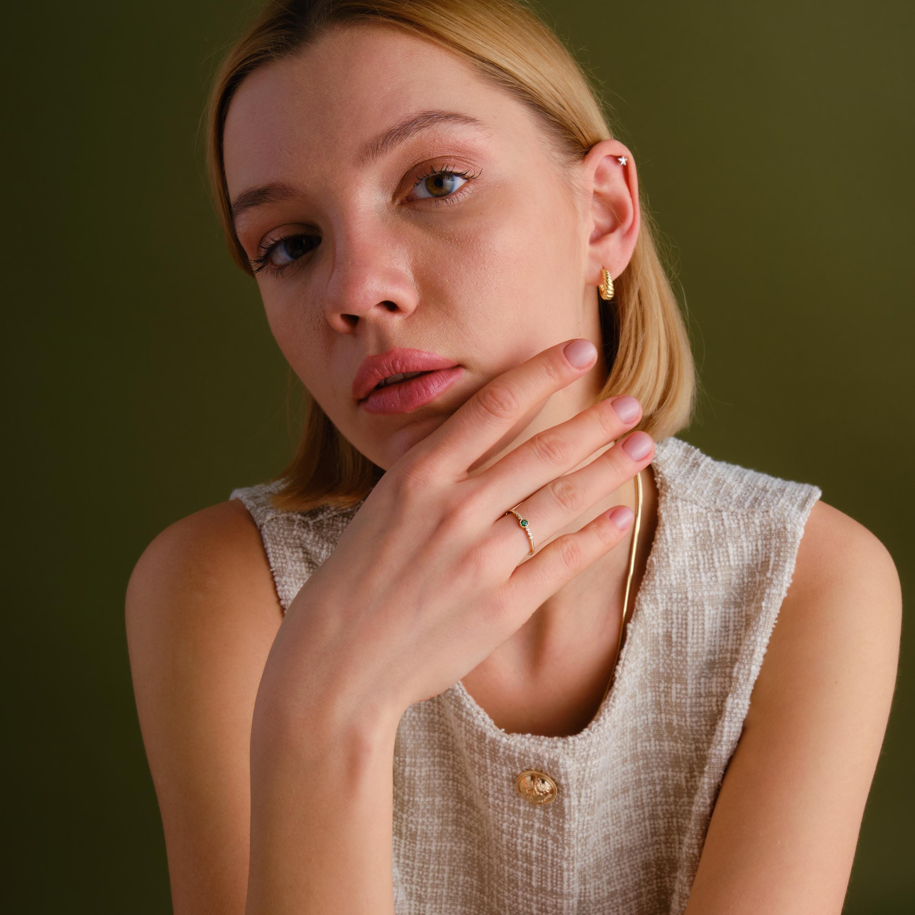Celebrate life's milestones with this mini birthstone 14K ring — a dainty emerald ring crafted for meaningful moments. Featuring green gemstone rings and side diamond rings, it radiates timeless elegance. Perfect as an art deco gift summer piece, a promise solid gold token, or a custom birth month treasure.