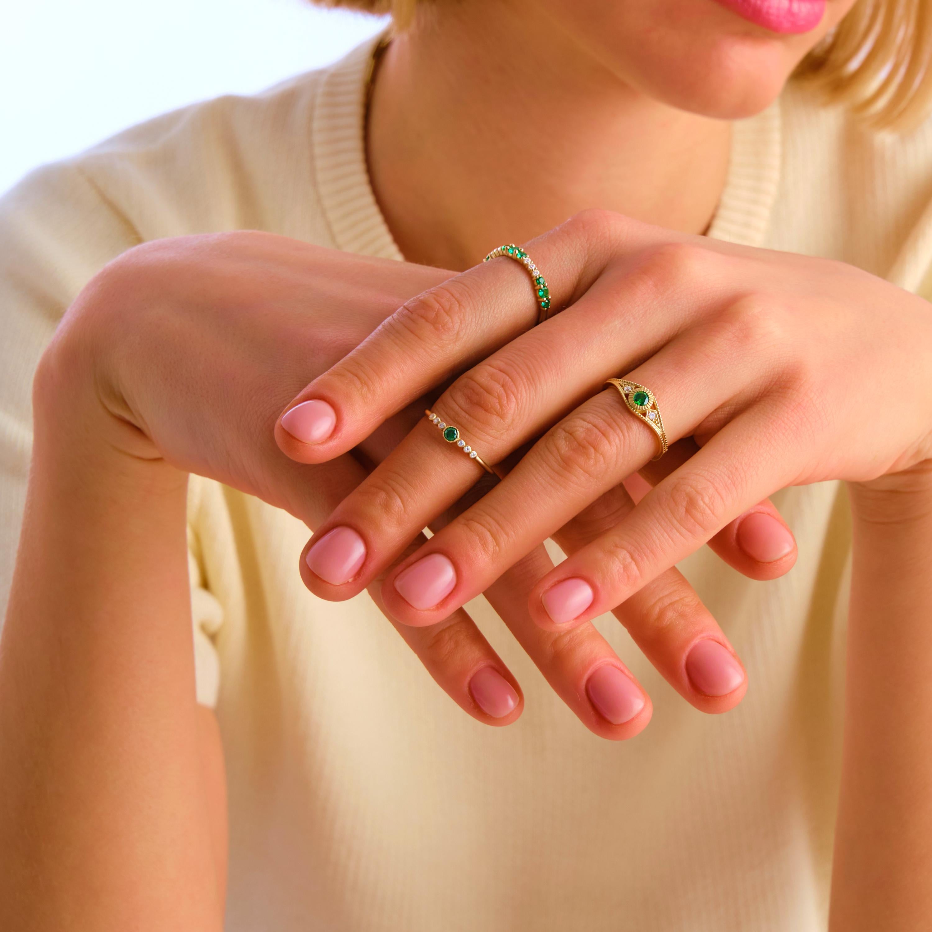 Timeless in form and refined in detail, this emerald wedding ring is elevated by side diamond rings and a sculptural split shank ring 14k silhouette. Designed as a personalized present with birthstone artdeco inspiration, it bridges elegance and emotion. From emerald engagement to vintage braided band, every element speaks intention.