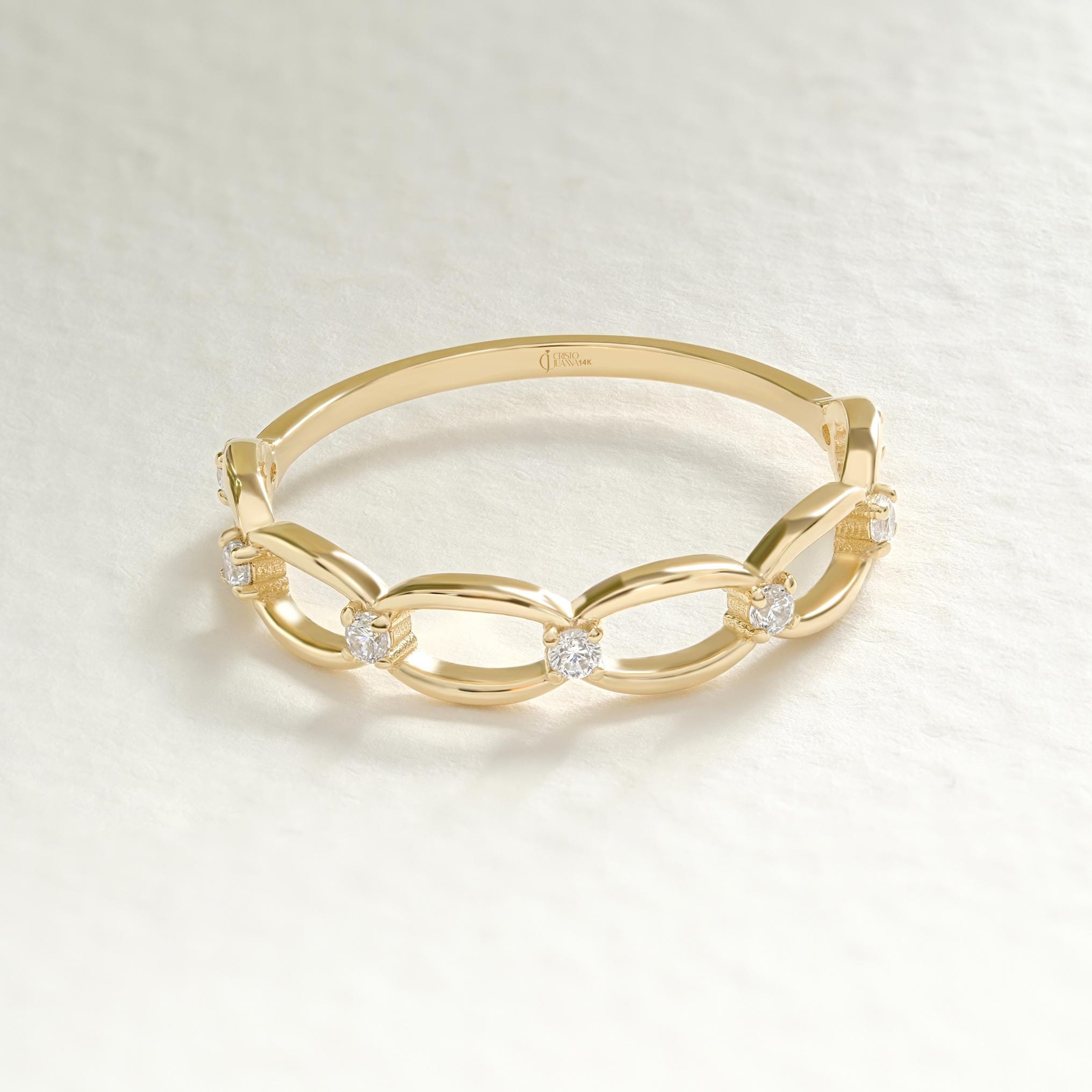 Bold yet delicate, this open chain link ring blends modern edge with timeless grace. Featuring a chain diamond band and dainty stacking ring style, it shines on any pointer finger ring or thumb pinky ring. Crafted in tiny small round 18k with moissanite multilink brilliance, it becomes a lovely chain ring for everyday elegance.
