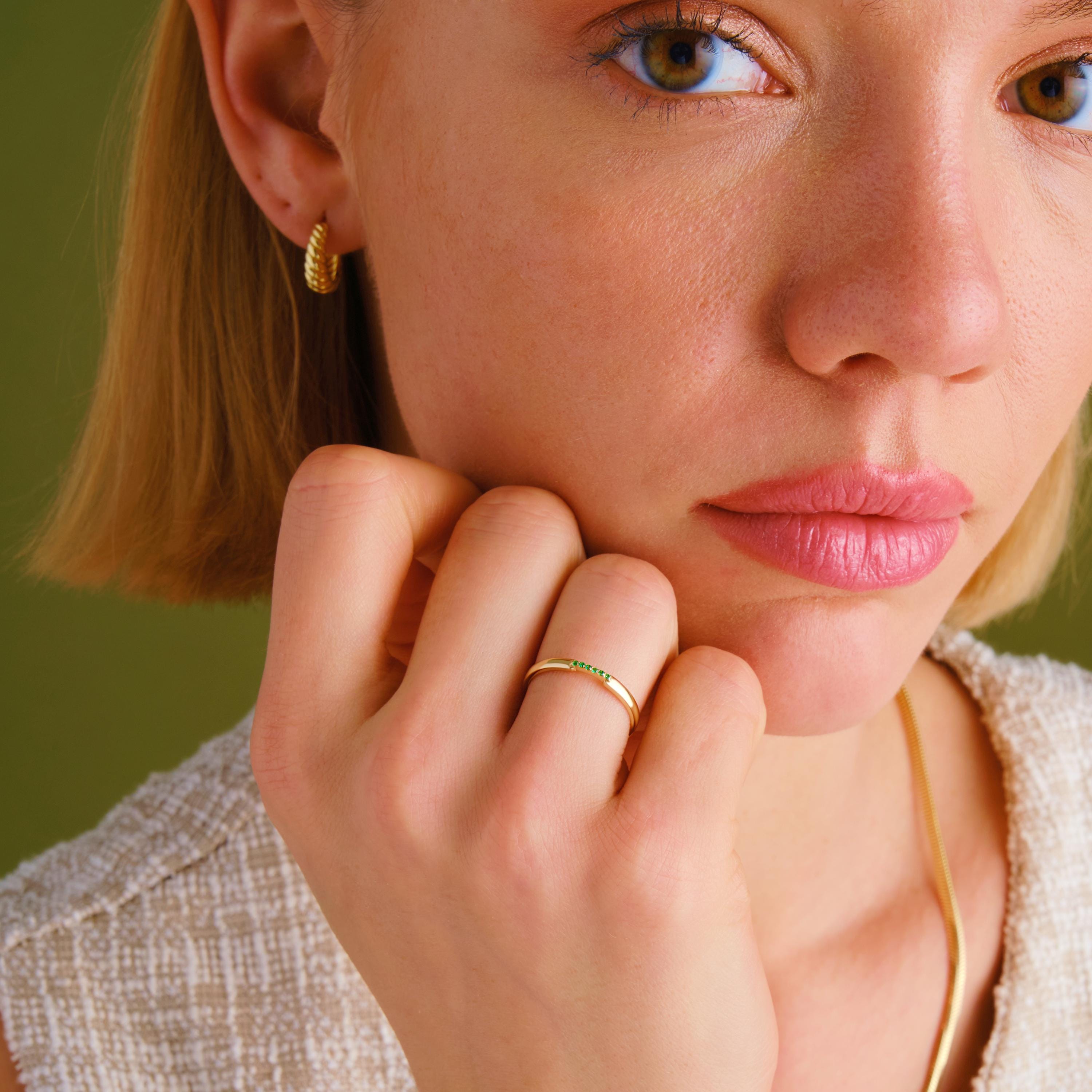 Dainty Emerald Band – 14K Solid Gold Family Birthstone Ring 💚✨
Simple, elegant, and full of meaning — this dainty emerald ring features tiny sparkling green stones in a delicate pavé setting, perfect for celebrating a loved one’s birth month or adding a pop of color to your daily style.

Whether worn as a mini birthstone ring, a custom gemstone ring, or stacked for a trendy Insta look, this piece is the perfect gift for her — timeless, personal, and effortlessly stylish.