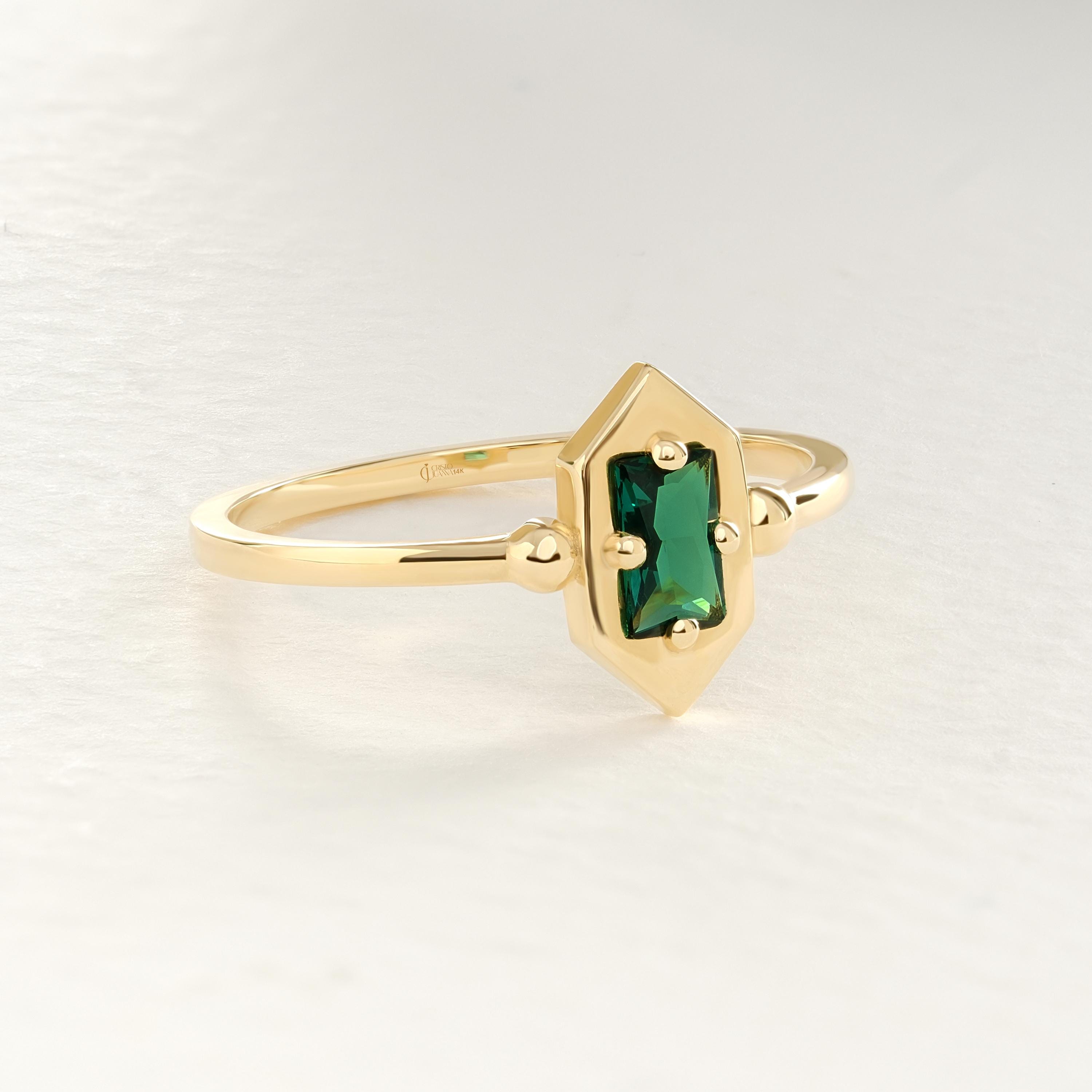 Baguette Emerald Ring – 14K Yellow Gold 💚✨
Elegant baguette-cut emerald ring in a sleek vertical design, perfect for stacking or wearing solo. A timeless birthstone piece that brings a pop of green to any jewelry collection, ideal for lovers of dainty yet striking rings. 💎