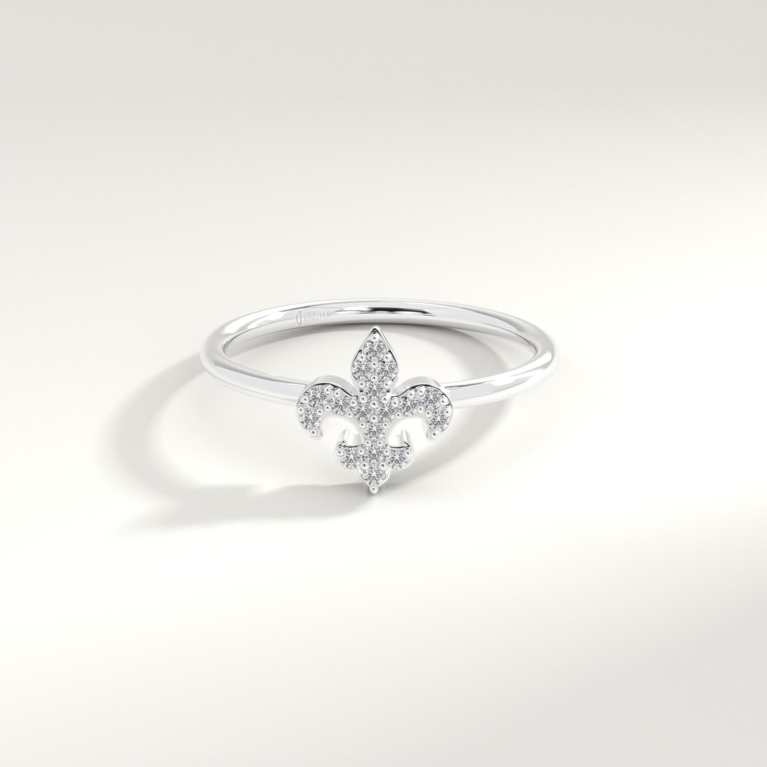 Fleur De Lis Diamond Ring – 14K Gold Stackable Lotus Symbol Ring for Women 💎🌸
A delicate blend of symbolism and sparkle, this Fleur De Lis ring features micro pave moissanite stones set in solid 14K gold. Representing purity, strength, and elegance, this lotus-inspired band is a meaningful and stylish choice for stacking or solo wear.