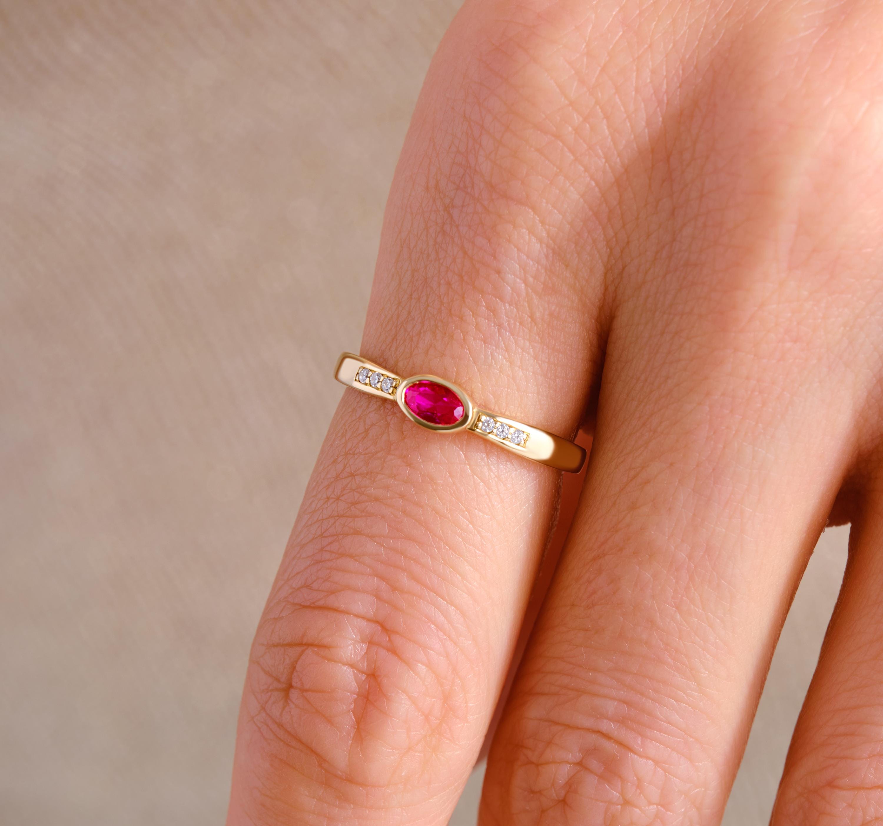 Ruby Engagement Ring with Side Diamond Band – 10K/14K/18K Solid Gold ✨💎
A stunning symbol of love, this bezel-set ruby ring features a deep red oval ruby accented by sparkling side diamonds. Perfect as a July birthstone ring, engagement ring, or anniversary gift, it blends timeless beauty with modern elegance.
