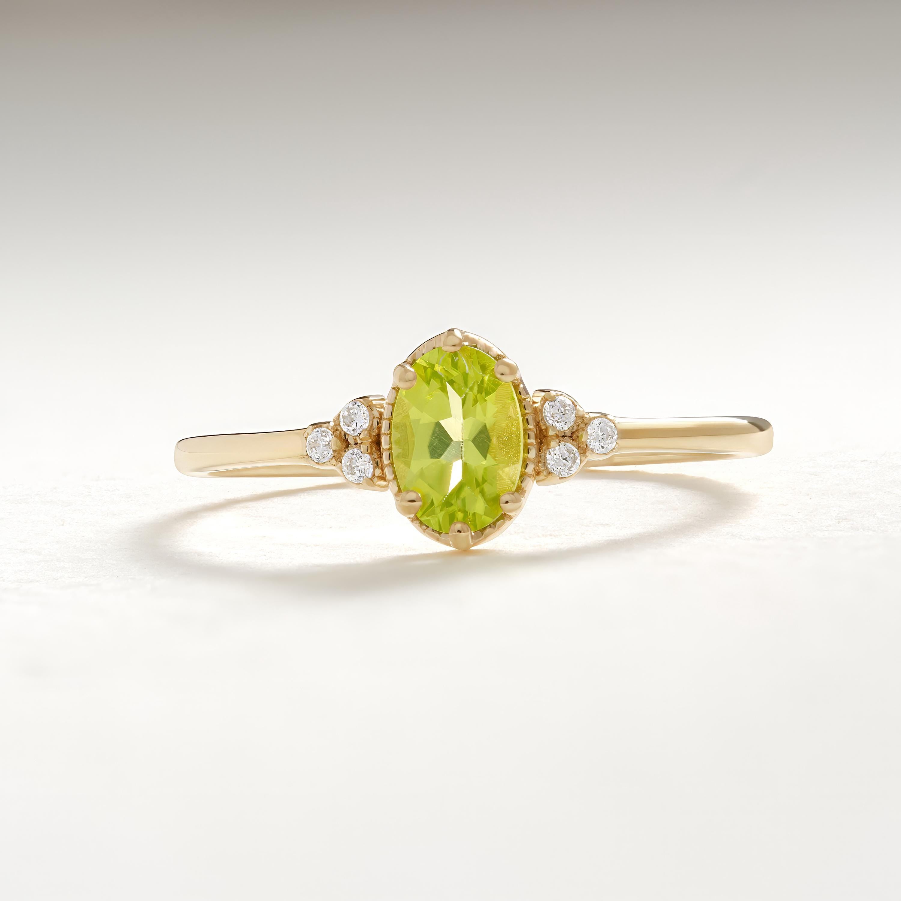 Natural Peridot Engagement Ring – 10K / 14K / 18K Solid Gold ✨💚
Celebrate love with this genuine oval-cut peridot ring, beautifully accented with sparkling side diamonds. Its fresh green glow makes it a unique engagement or wedding ring, perfect for women who adore natural beauty with a vintage touch.