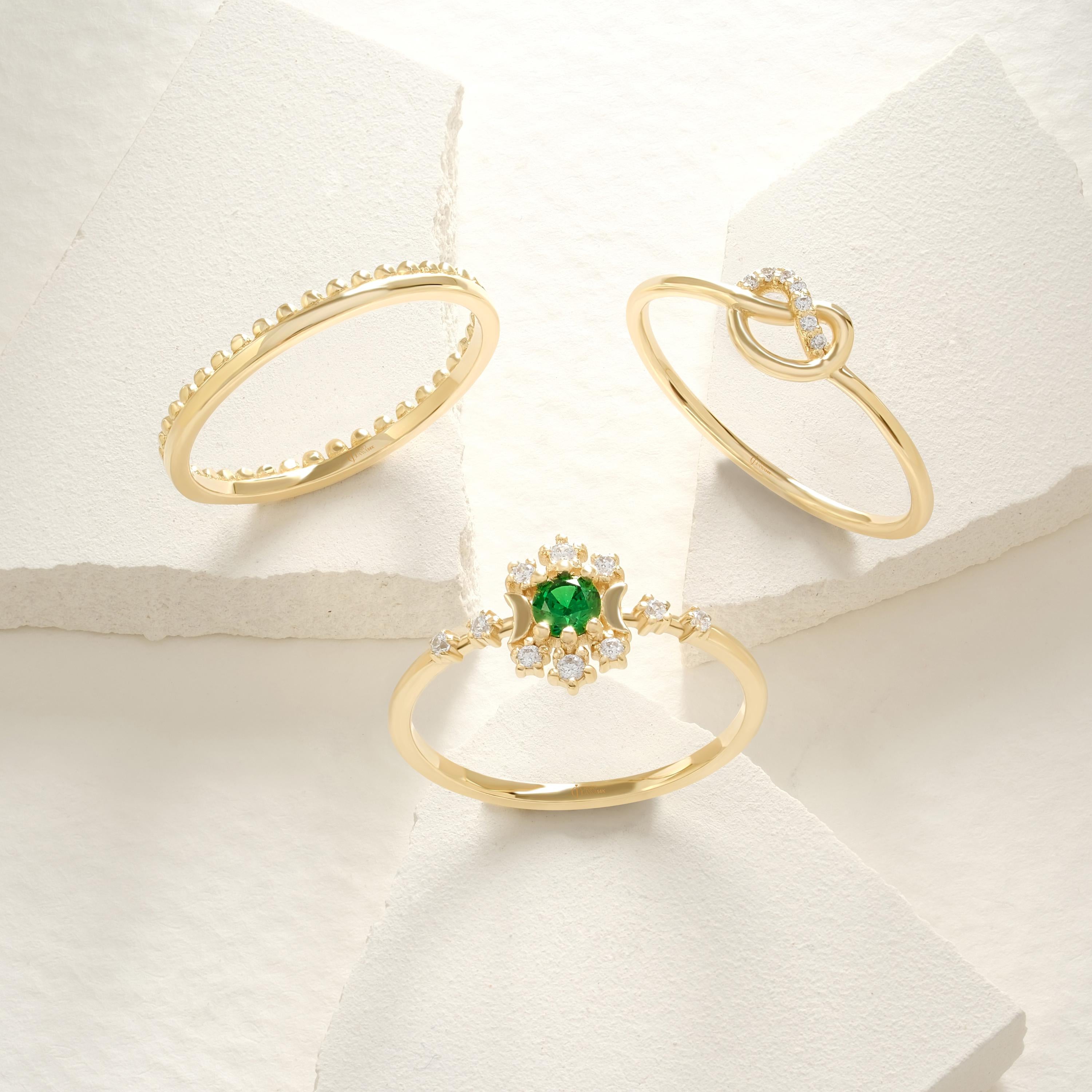 Love Knot Wedding Ring – 14K Solid Gold ✨💖
This delicate love knot ring features 7 tiny round-cut diamonds set along a dainty gold band — a timeless symbol of connection, unity, and unbreakable bonds. Perfect as a wedding promise ring, soulmate gift, or a meaningful token for your best friend.

Its minimalist heart-knot design is both elegant and symbolic, ideal for everyday wear or stacking.
