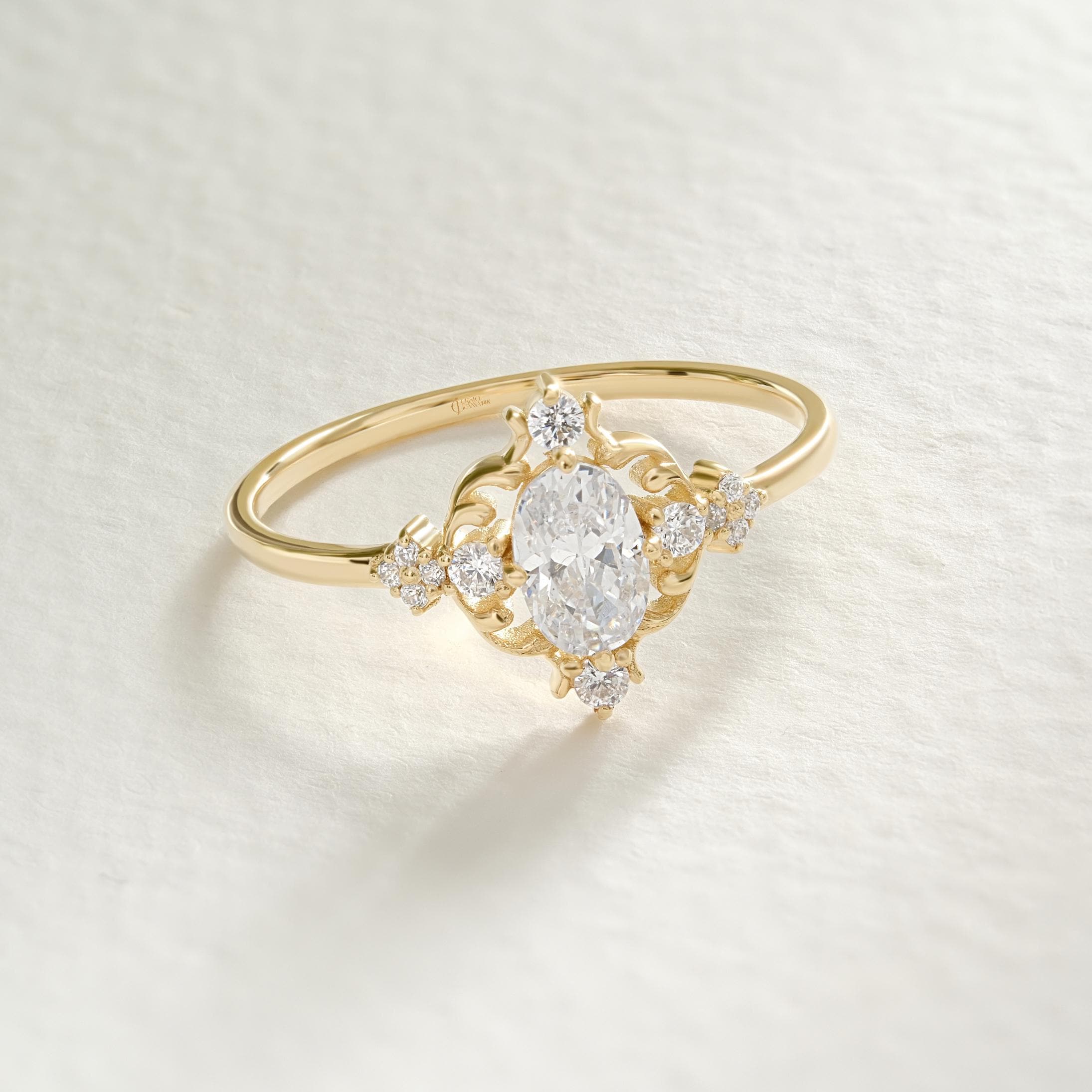 Oval Diamond Engagement Ring – 10K / 14K / 18K Solid Gold ✨💍
A timeless piece that blends vintage charm with modern elegance. Featuring a sparkling 6x4 mm oval-cut diamond (or moissanite) surrounded by delicate side stones, this ring makes a stunning choice for engagements, anniversaries, or milestone moments. 💎