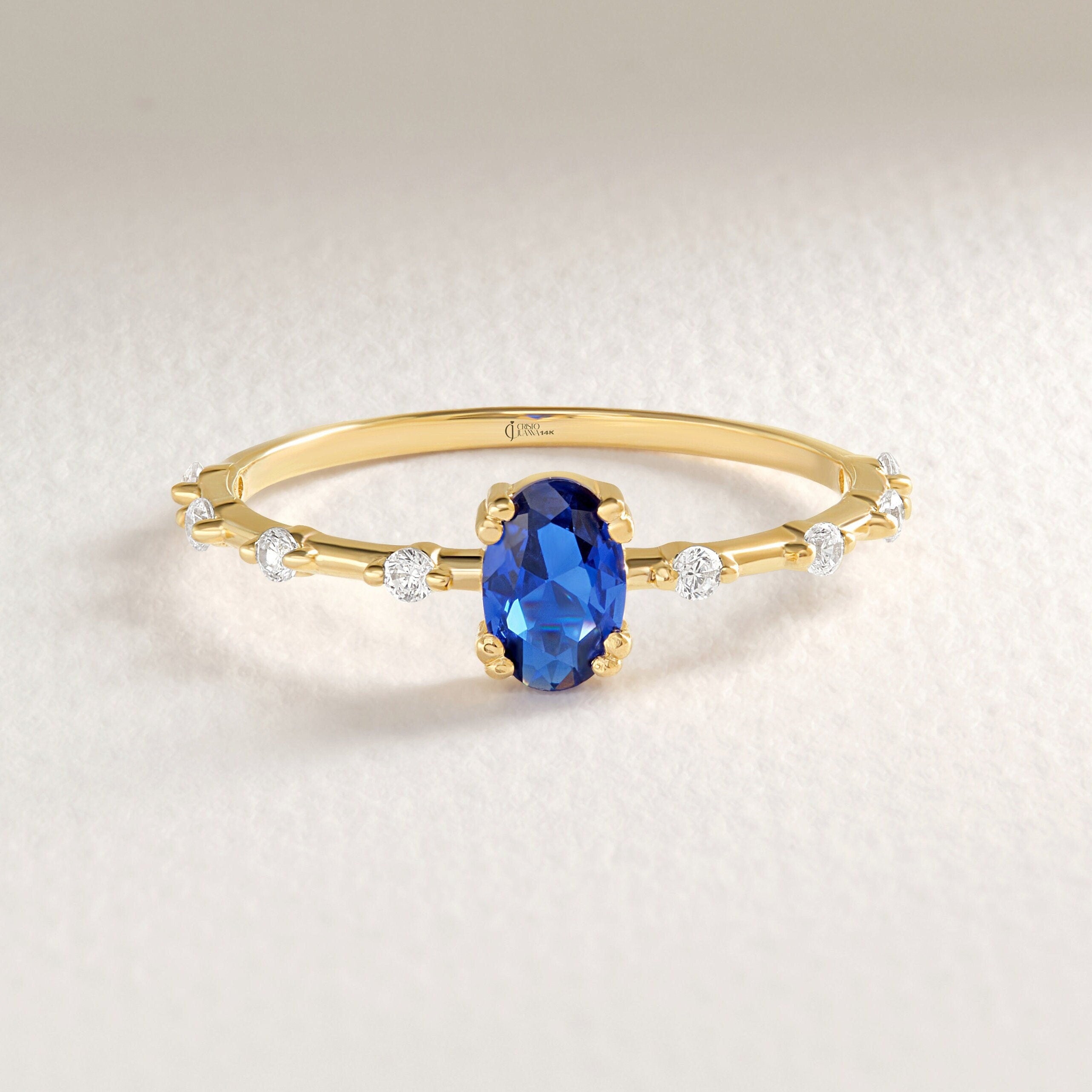 Oval Sapphire Engagement Ring – 14K Solid Gold ✨💙
A stunning oval blue sapphire engagement ring accented with sparkling side diamonds. Perfect for September birthdays or anyone who loves classic elegance, this ring can be customized with Diamond or Moissanite for the perfect shine. 💍