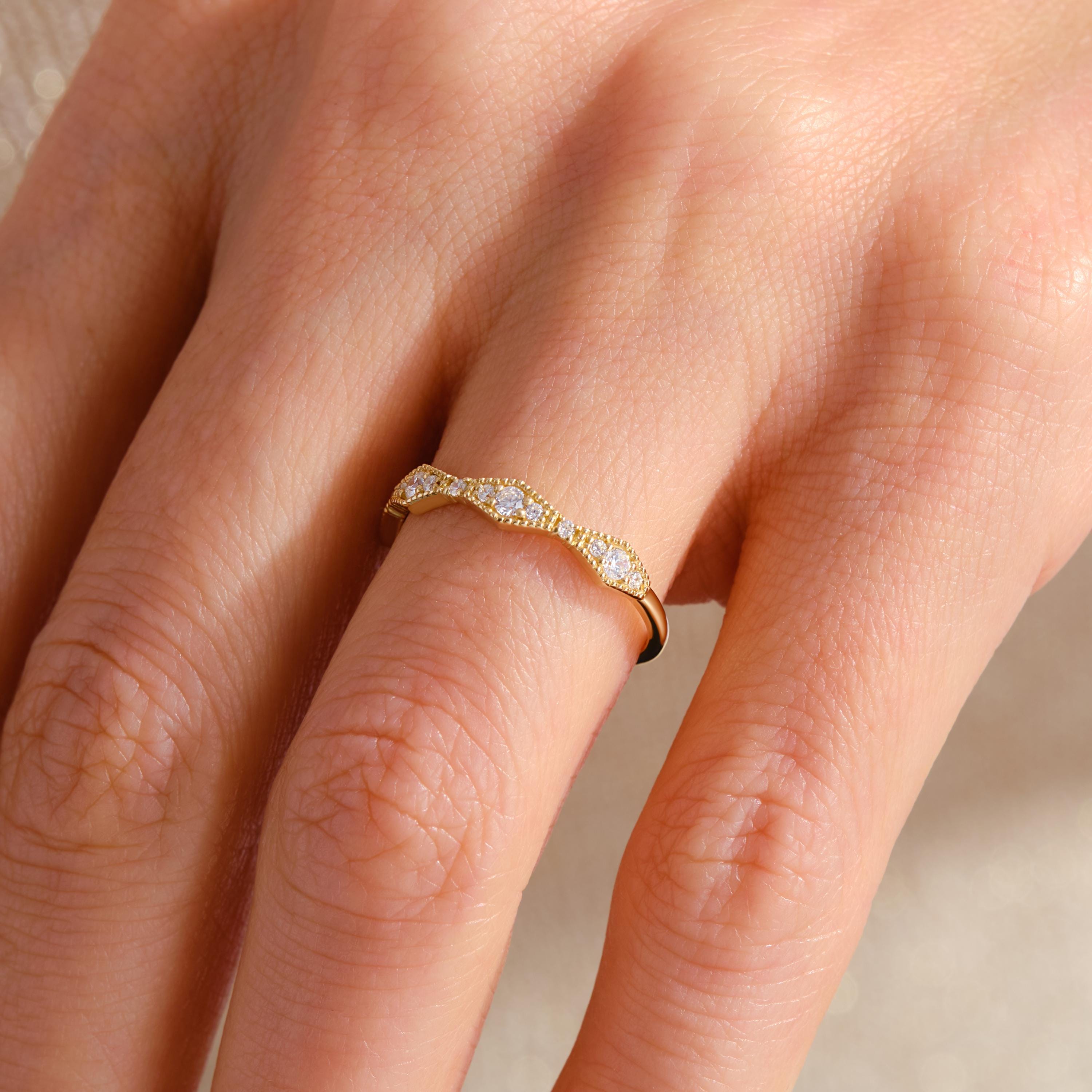 Petite Diamond Wedding Ring – 14K Solid Yellow Gold ✨💍
A dainty and timeless piece for your special day — this Petite Diamond Wedding Ring shines with elegance and simplicity. Its wavy half eternity design and delicate sparkle make it perfect for everyday wear or as a stacking band. Ideal for brides who love understated luxury 💫