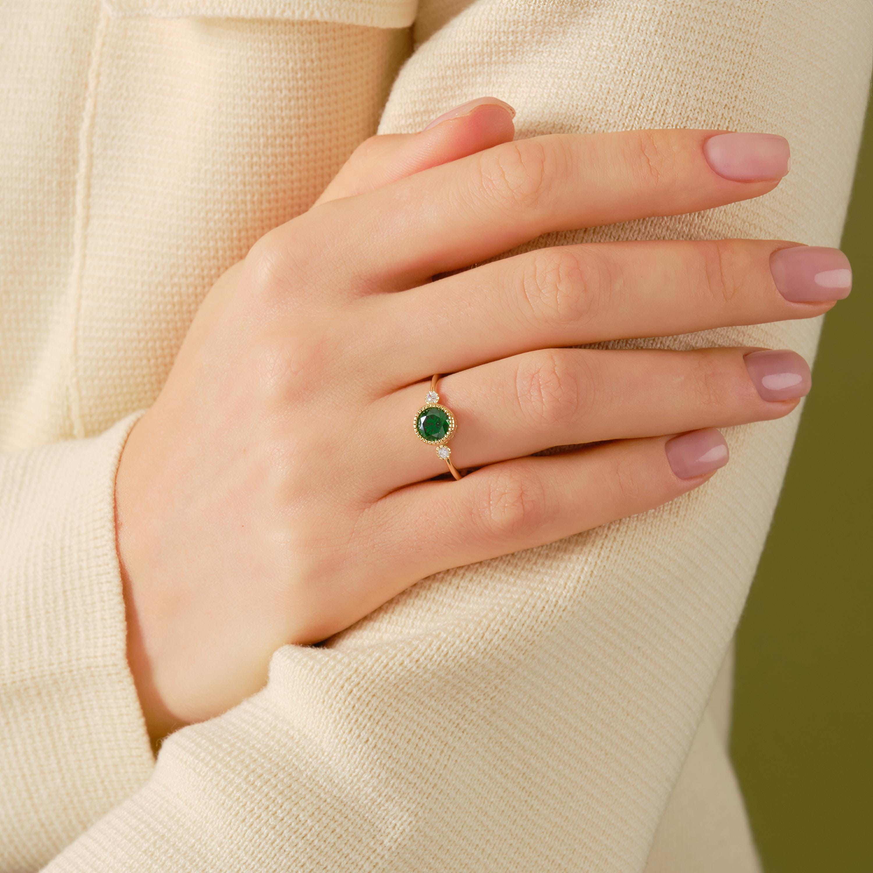 ✨ 14K Solid Gold Emerald Ring with Side Diamond Accents
Dainty Birthstone Ring with Tiny Moissanite Option – Vintage Inspired Green Gemstone Ring for Women

Celebrate timeless elegance with this vintage-inspired emerald ring, crafted in solid gold and designed to sparkle with delicate side stones. Its slim band and classic silhouette make it perfect for everyday wear or meaningful occasions.