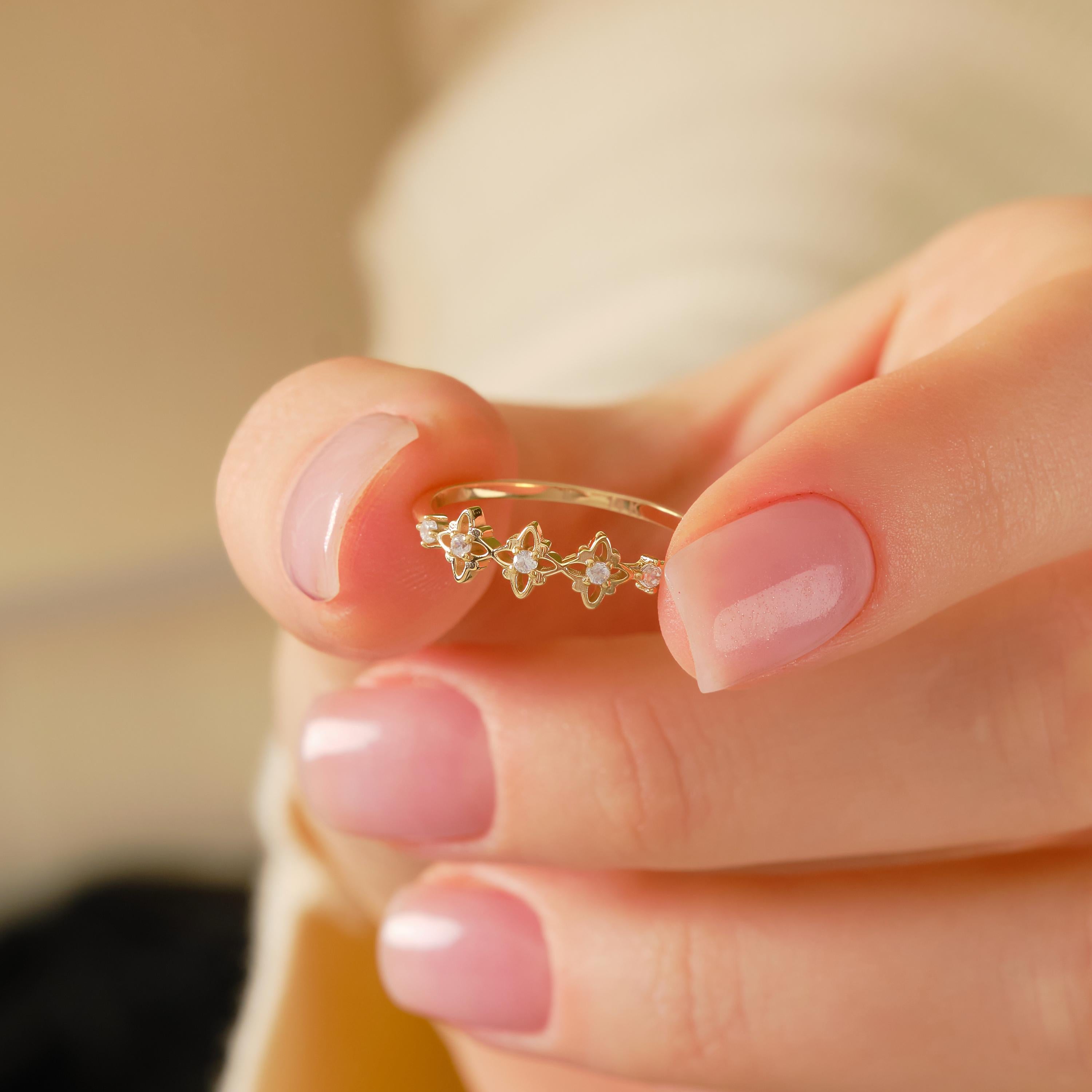 ✝️ Rosary Cross Diamond Ring | 14K Solid Gold Tiny Moissanite Band

Minimal yet deeply meaningful, this Rosary Cross Diamond Ring blends spiritual symbolism with modern elegance. Featuring scattered tiny stones arranged in a delicate cross motif and subtle clover-inspired details, this handcrafted ring is designed for everyday wear and timeless devotion.