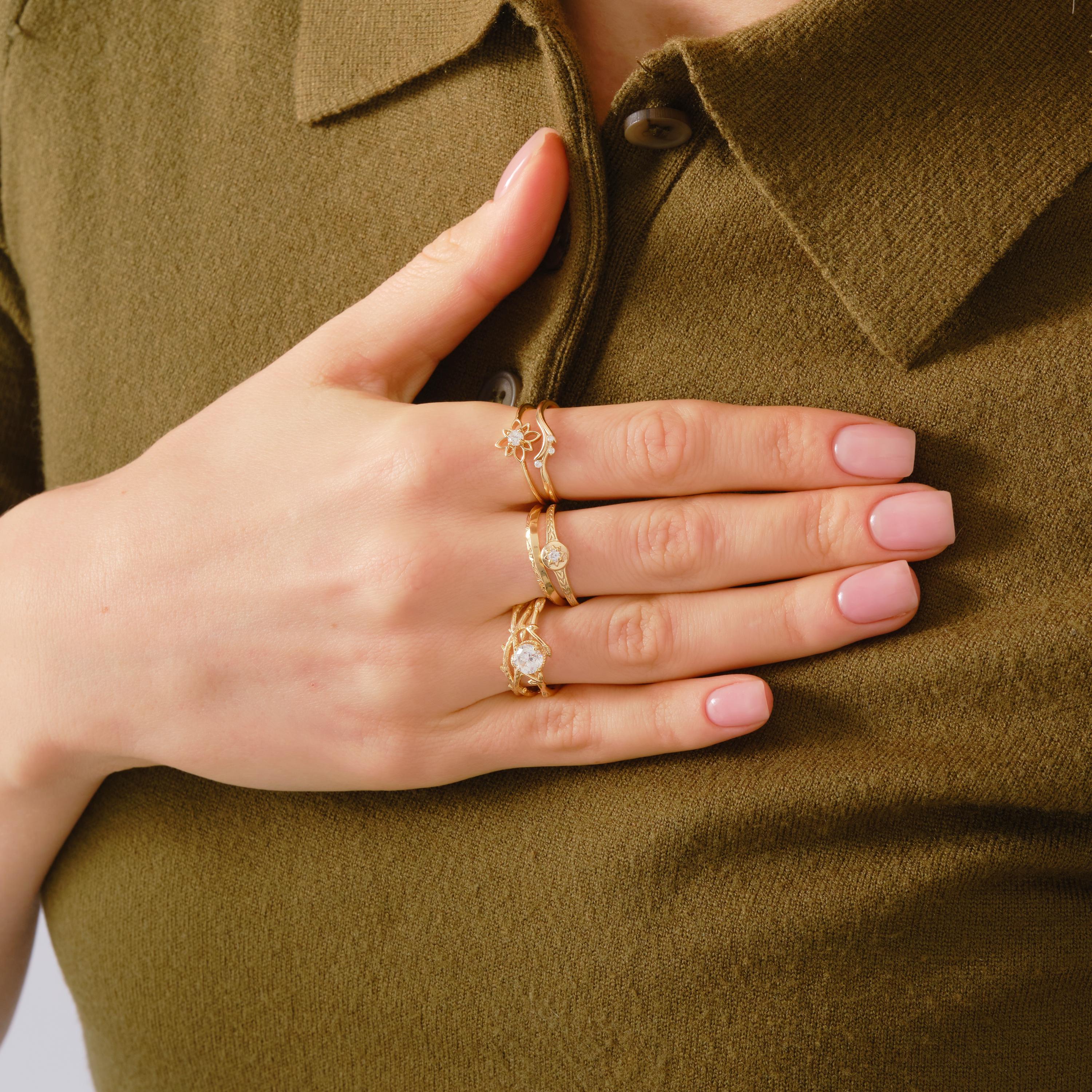 🌼 Diamond Open Daisy Ring | 14K Solid Gold Dainty Floral Stackable Band

Inspired by vintage elegance and the soft beauty of nature, this Diamond Open Daisy Ring features a delicate floral silhouette with a sparkling round stone at its center. Handcrafted in solid gold, this slim and graceful band is designed for effortless everyday wear and easy stacking. Its open daisy motif brings a light, boho charm while maintaining a timeless and feminine appeal.