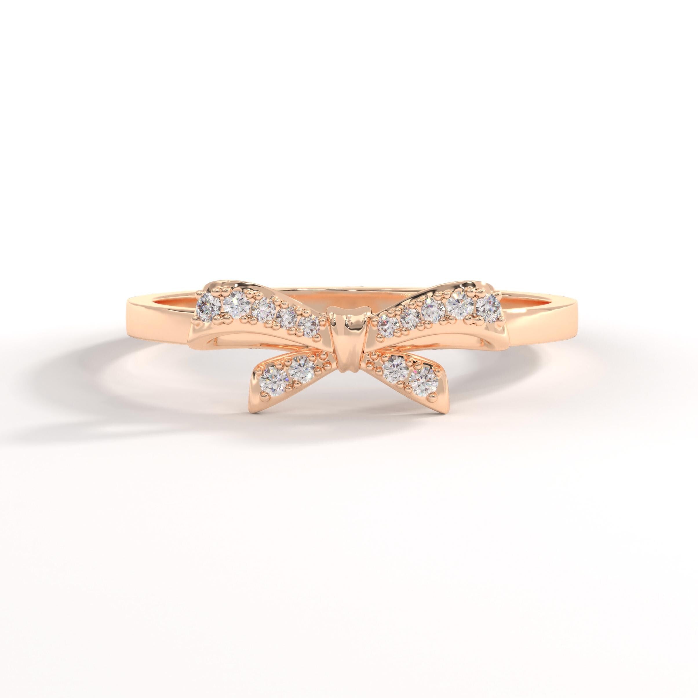 ✨ 14K Solid Gold Ribbon Ring – Dainty Diamond Bowtie Ring for Women
Little Bowknot Ring • Symbol of Love, Friendship & Soulmates

Graceful, feminine, and full of meaning 🤍 This dainty ribbon bowtie ring is designed to symbolize unbreakable bonds—perfect for soulmates, best friends, or a heartfelt gift for someone special. Its elegant bow shape and delicate sparkle make it ideal for everyday wear.